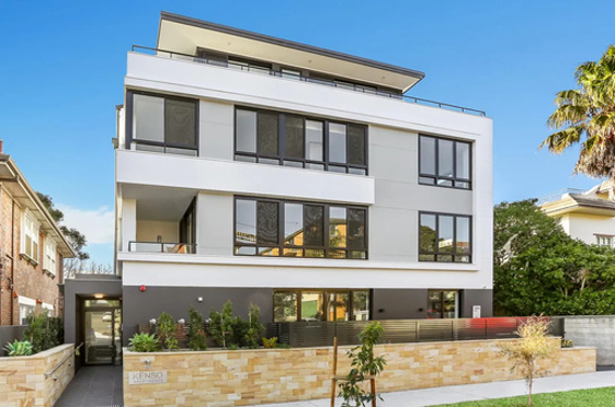 Kenso Apartments — Feature Sandstone Entry — Sandstone masonry · Conservation finish